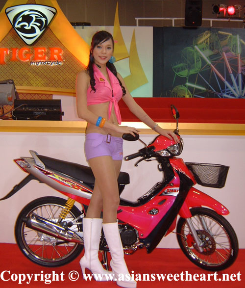 Long legged booth babe at Tiger motorcycles