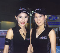 Models at the Mobil products booth