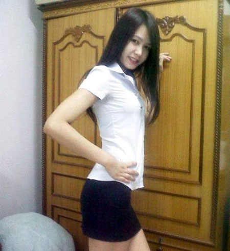 Young Thai girl in a hotel room